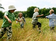 kids playing in a field 